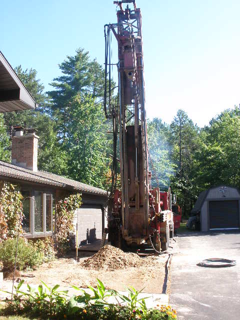 Drill rig continuing to final depth